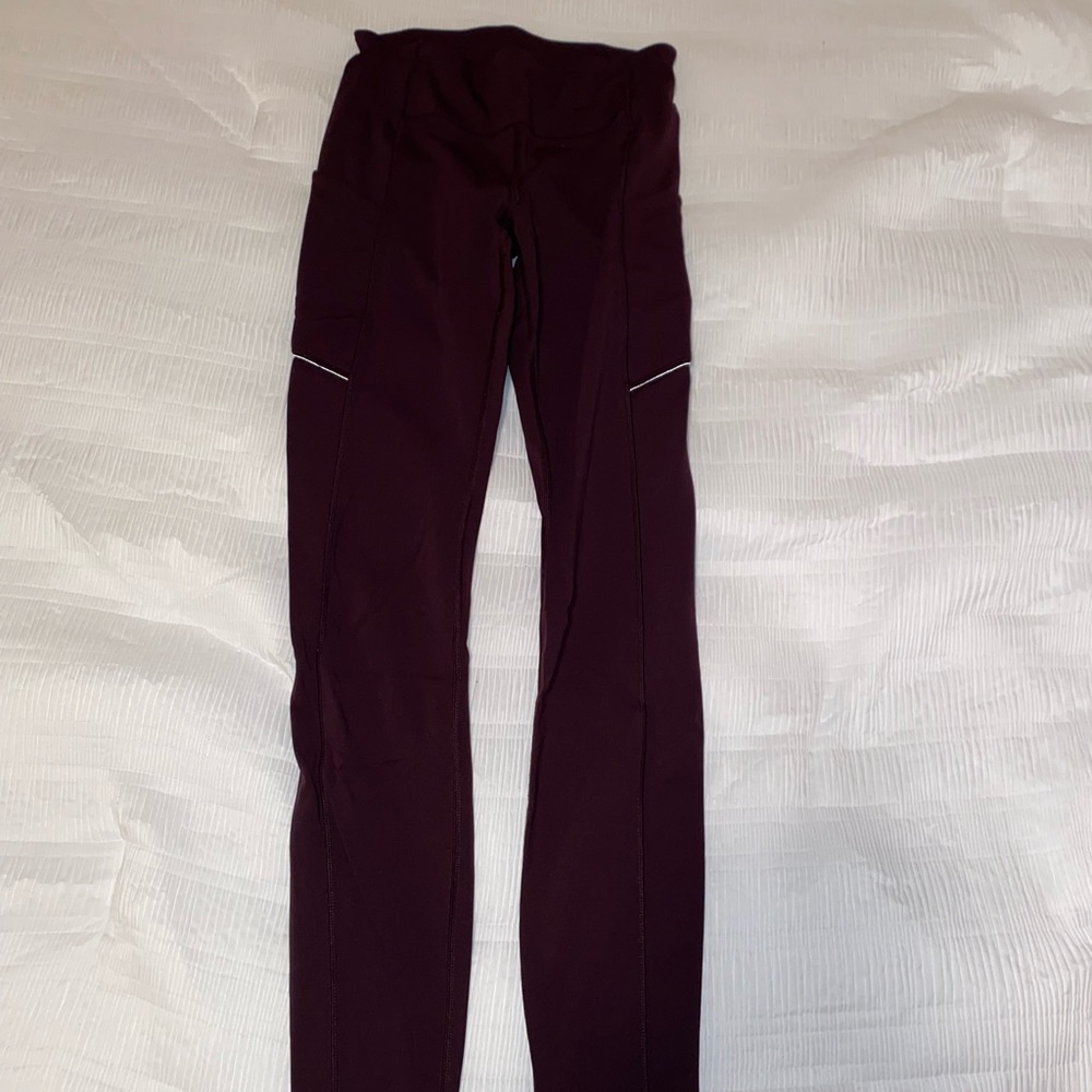 Mahogany colored lululemon leggings.